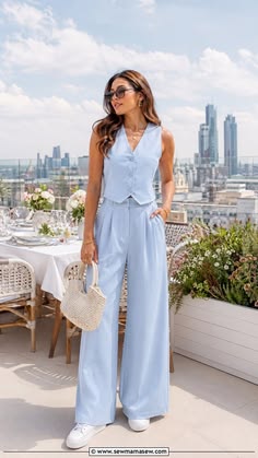 Light blue waistcoat and wide-leg trousers